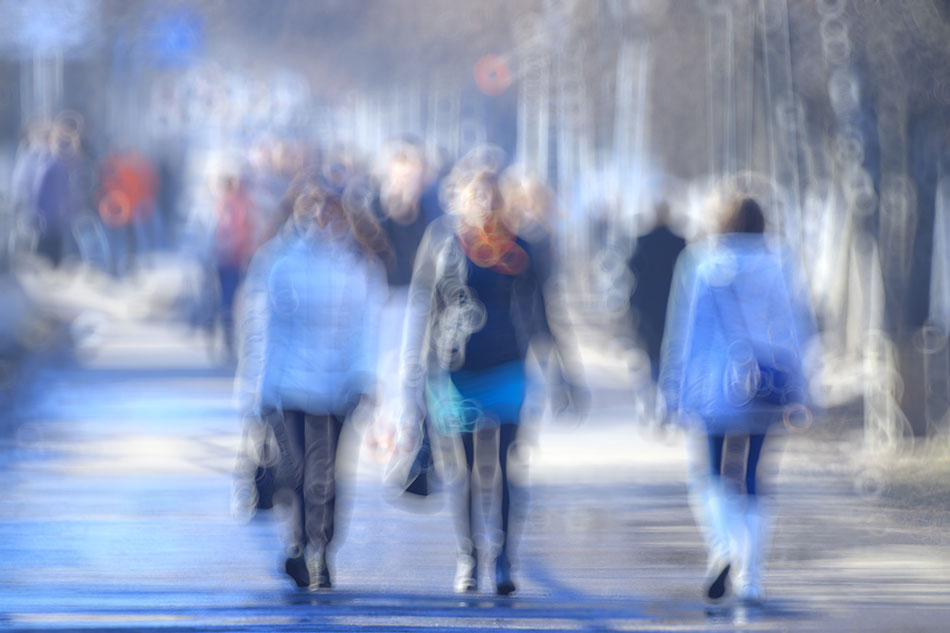 blurred vision of city sidewalk