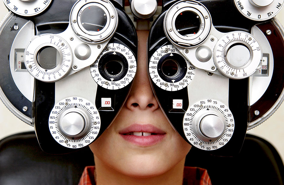 Boy in eye exam for Children’s Vision Month