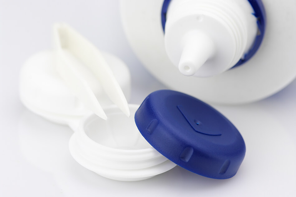white contact lens solution with white and blue contact lens case
