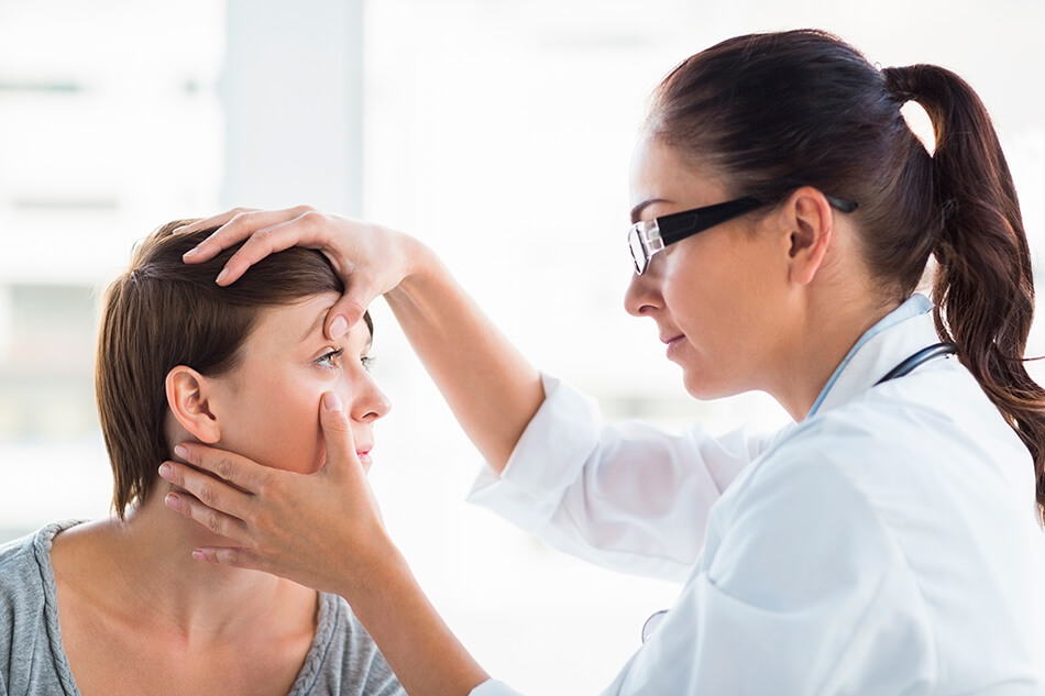 Optometrist checking a patient’s eye