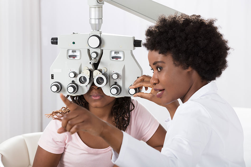 woman having contact lens exam