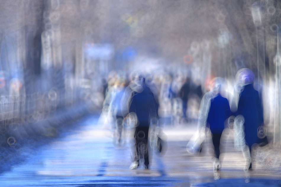 outdoor scene with blurred blue people