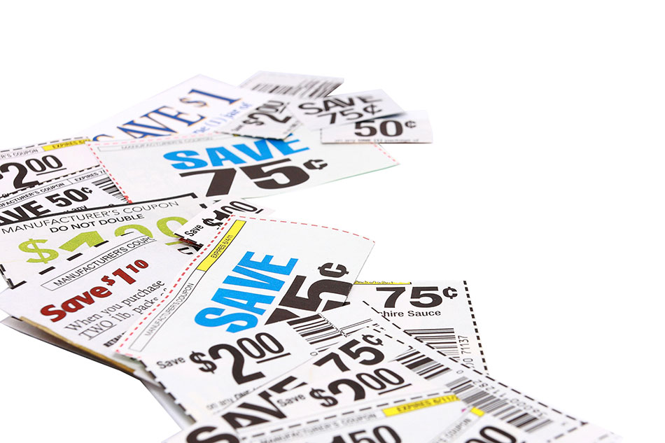 scattered coupons on white background