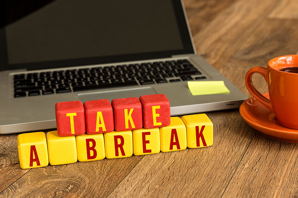 take a break in red and yellow blocks, laptop and orange coffee cup and saucer