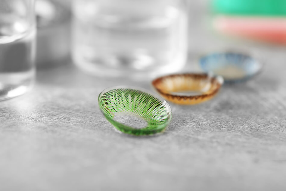 Prescribed colour contact lenses on table