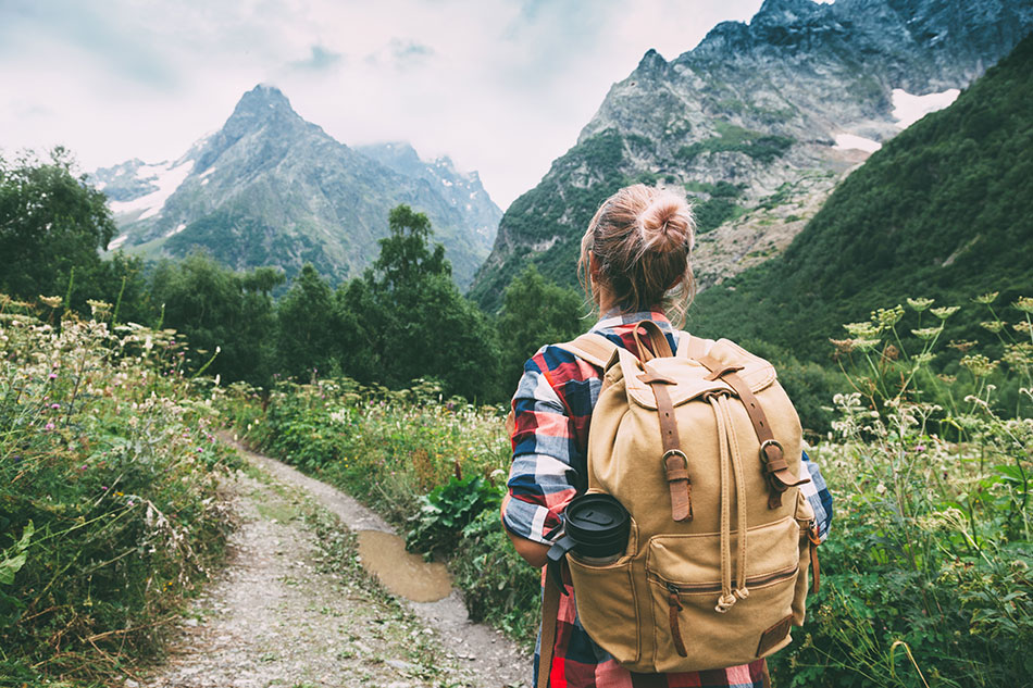 woman hiking in mountains