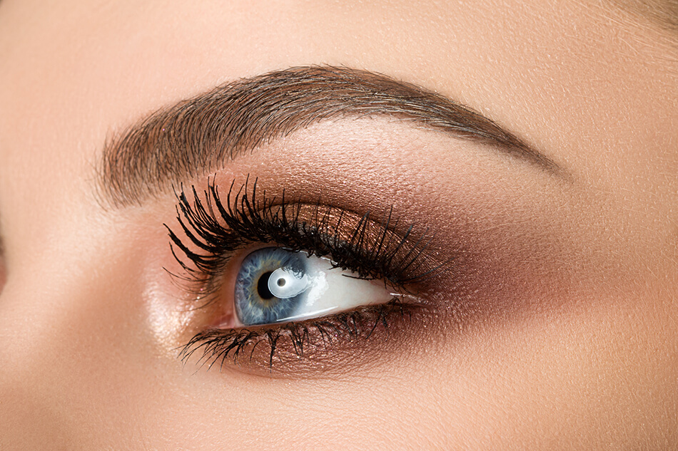 close up of woman wearing colour enhancing contact lenses