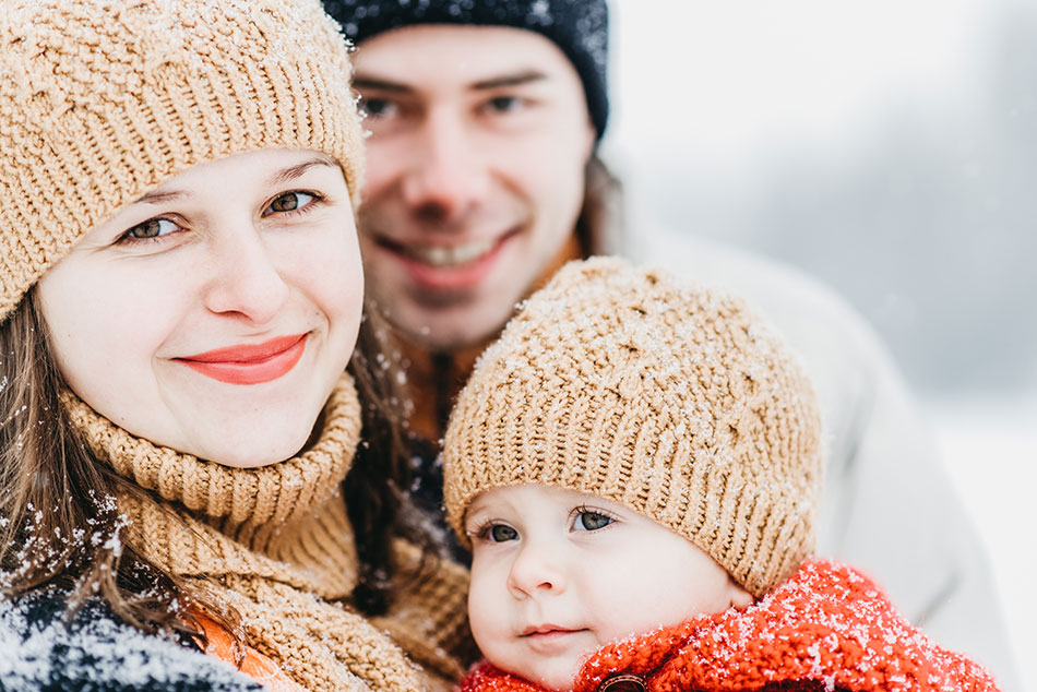 Young family in snow