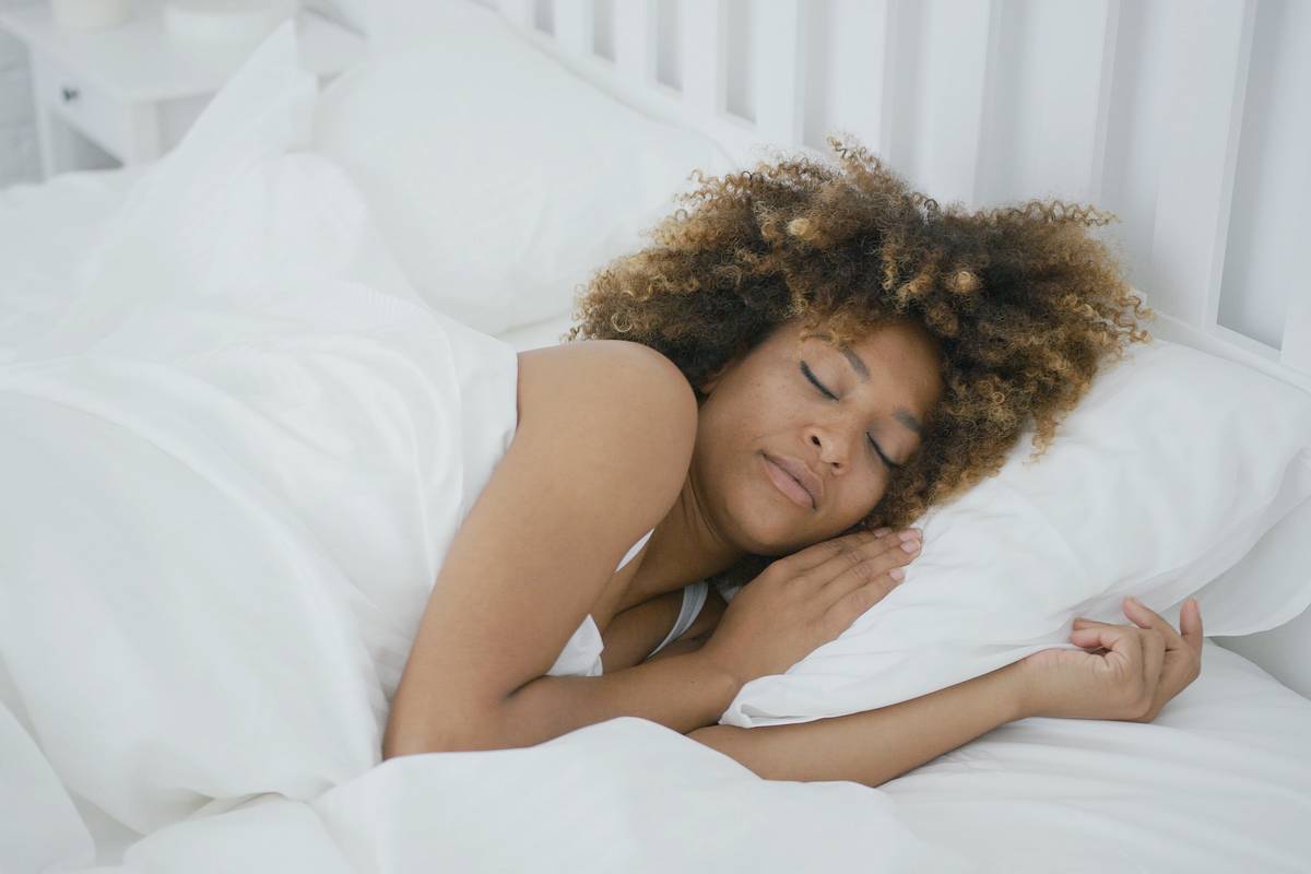 Young woman sleeping with contacts